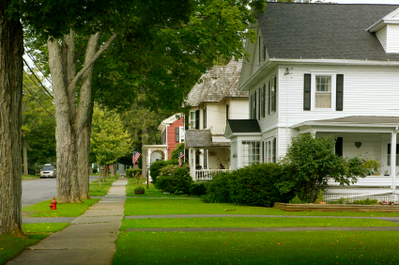 Small town sidewalk and homes